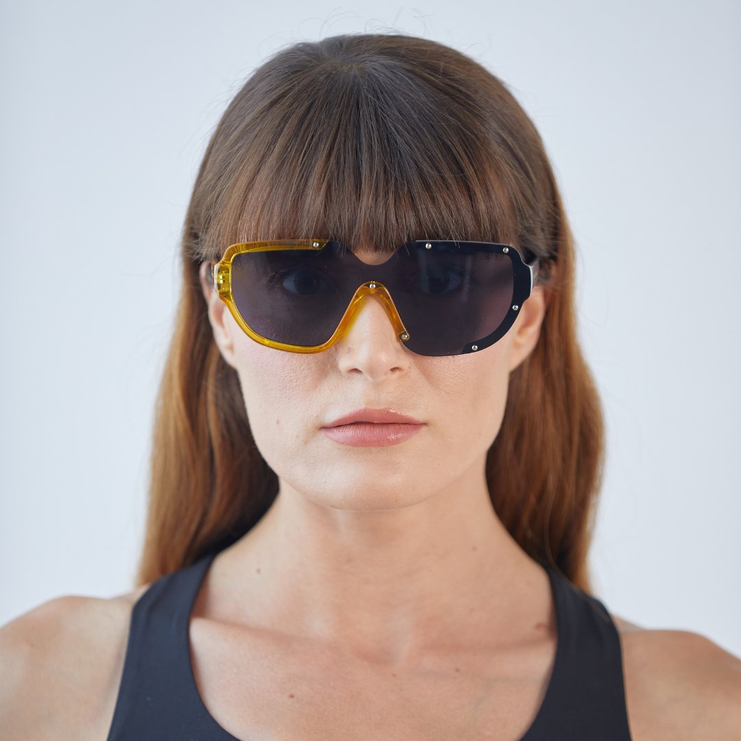Model wearing CYBER / Solar Midnight sunglasses